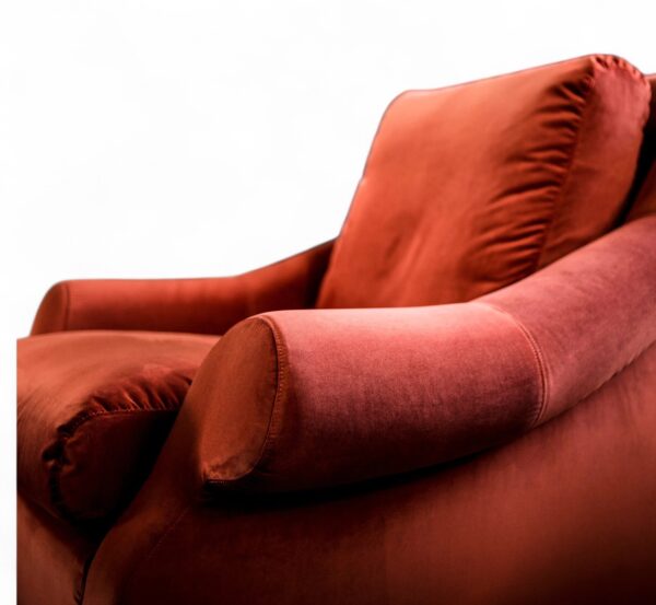 Luxury crimson velvet armchair with elegant curves