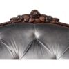 French-style velvet armchair with button tufting and curved back