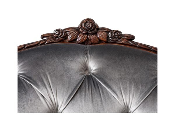 French-style velvet armchair with button tufting and curved back