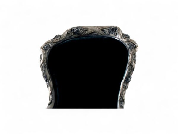 Ornate carved wood chair with traditional Venetian detailing