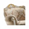 Luxurious armchair with dune damask fabric and ornate design