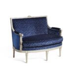 Louis XVI Style Settee with carved wood frame and blue velvet upholstery