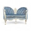 mperial Victorian Loveseat with blue tufted upholstery and carved wooden frame
