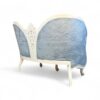 Classic Victorian-inspired loveseat with ornate detailing and royal finish