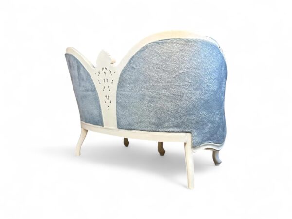 Classic Victorian-inspired loveseat with ornate detailing and royal finish