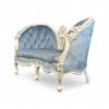 Antique-style Victorian two-seater loveseat with twin-arched backrest