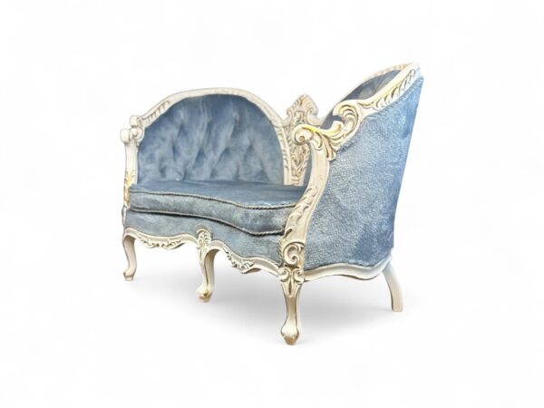 Antique-style Victorian two-seater loveseat with twin-arched backrest