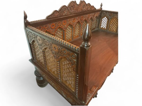Vintage-style divan with elegant wooden design and sturdy legs