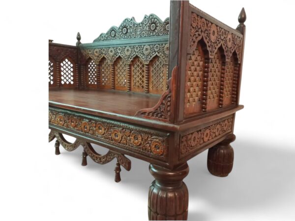 Handcrafted wooden seating with a classic design and rich detailing