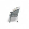 Chic Carved Loveseat with intricate wood detailing and tufted backrest