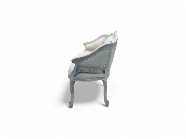 Chic Carved Loveseat with intricate wood detailing and tufted backrest