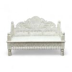 Luxurious hand-carved daybed with white finish, ideal for royal-inspired interiors