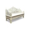 Ornate wooden daybed featuring traditional Maharaja-style carvings