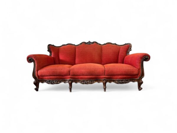 Victorian carved sofa with scroll arms and cabriole legs