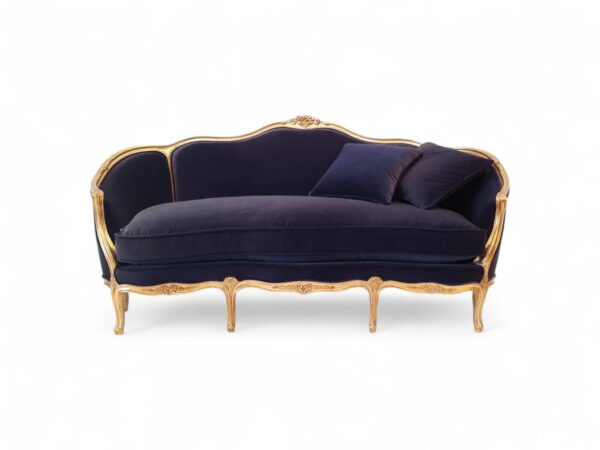 French Rococo sofa with floral carvings and deep blue upholstery