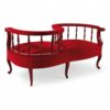 Classic Victorian-inspired settee with ornate details and vibrant finish