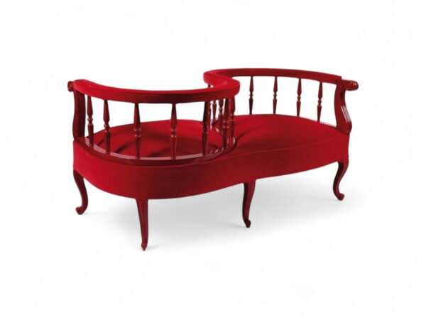 Classic Victorian-inspired settee with ornate details and vibrant finish