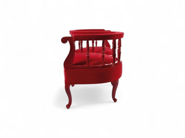 Hand-carved wooden Victorian settee with plush seating and cabriole legs