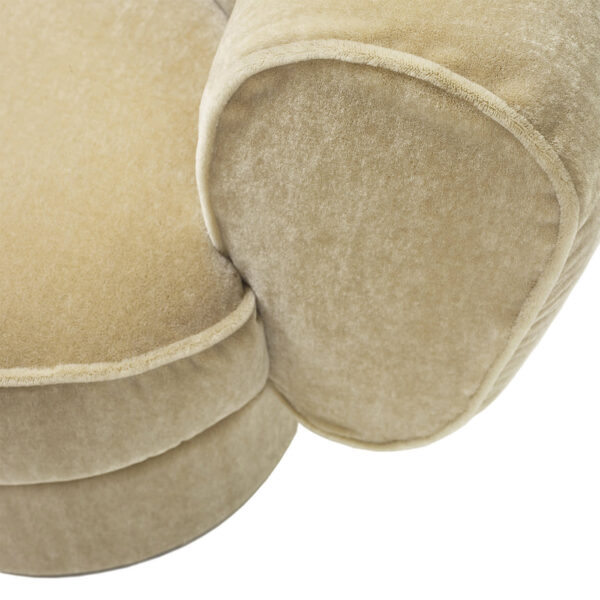 Elegant modern sofa with sculpted curves and channelled fabric upholstery