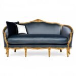 Luxurious Louis XV-style sofa in gold and navy velvet