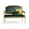 Emerald Velvet Settee with gold-carved wooden frame and soft green cushions