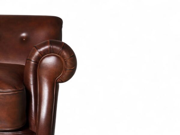 Traditional leather loveseat with tufted back and rolled arms