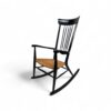 Wooden rocker with natural cane seating for airy comfort