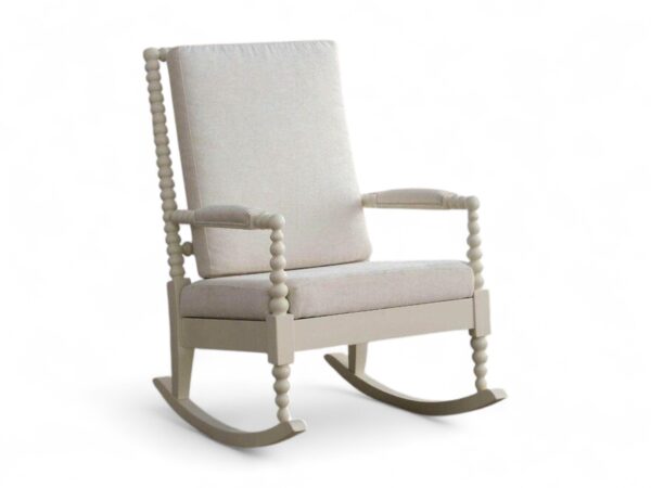 Classic spindle-style wooden rocking chair with fabric upholstery