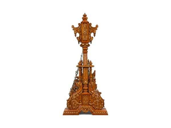 Luxurious teak wood swing with traditional carvings and regal presence