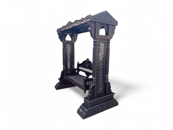 Heritage-style teak wood swing with ornate detailing and traditional design