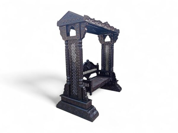 Heritage-style teak wood swing with ornate detailing and traditional design