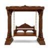 handcrafted wooden swing with dark finish and carved pillars