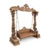 Traditional wooden jhula with antique polish and royal peacock carving
