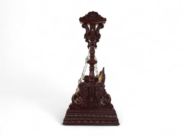Side angle of Maharaja Carved Swing showing intricate pillar carvings