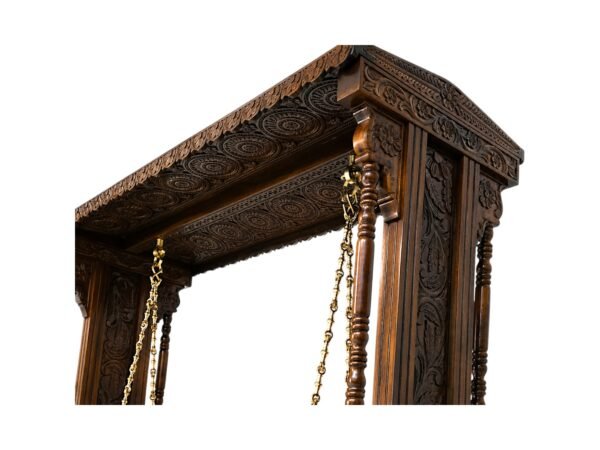 Royal Hand-Carved Swing with intricate wooden carvings and brass chains