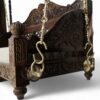 Close-up of carved floral patterns on Royal Hand-Carved Swing backrest