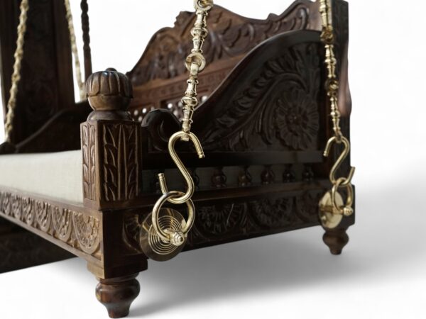Close-up of carved floral patterns on Royal Hand-Carved Swing backrest