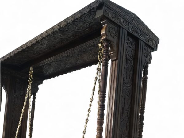 Royal Hand-Carved Swing with intricate wooden carvings and brass chains
