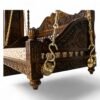 Close-up of carved floral patterns on Royal Hand-Carved Swing backrest
