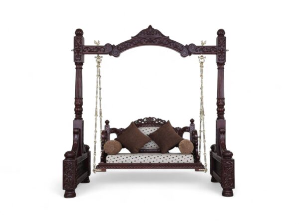Victorian Style Swing with intricate carved wooden frame and brass chains