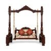 Victorian Style Swing with intricate carved wooden frame and brass chains