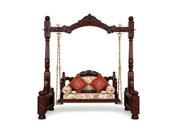 Victorian Style Swing with intricate carved wooden frame and brass chains
