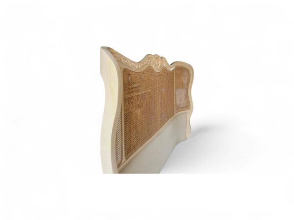 Designer Venezia Cane Bed showcasing intricate carving