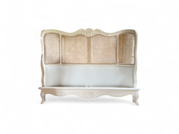 Luxury bed with antique white finish and hand-woven cane panels