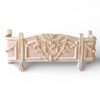 Blush and ivory carved bed with vintage European charm