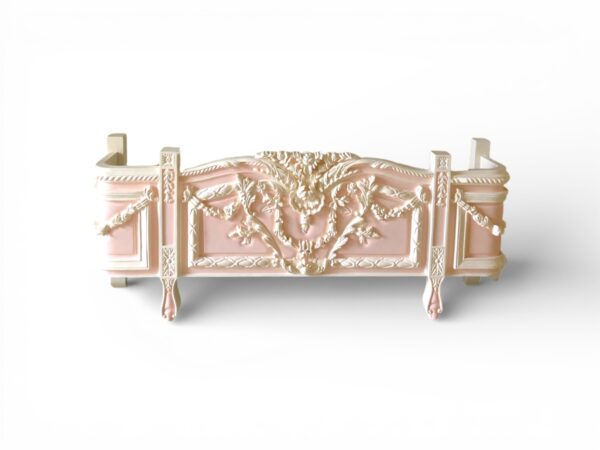 Blush and ivory carved bed with vintage European charm