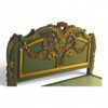Hand-carved emerald bed with Baroque floral and ribbon detailing