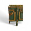 Regal carved bed with high-relief headboard and scroll motifs