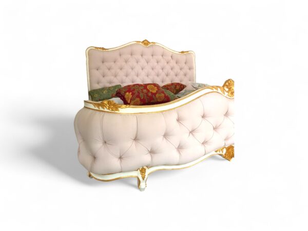 Italian baroque-style blush velvet bed with tufted design.