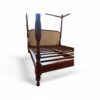 Traditional canopy bed frame with rich wood finish